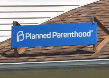 A Planned Parenthood sign sits atop the building at 902 Manor St. in Lancaster.