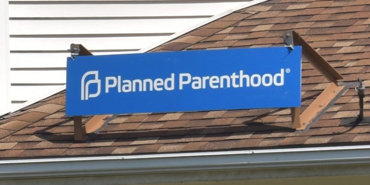 A Planned Parenthood sign sits atop the building at 902 Manor St. in Lancaster.