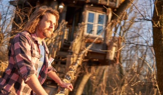 Blake Ringenberg stands outside the Lord of the Rings treehouse he designed and built in Mount Joy.