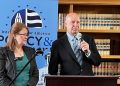 Sen. Doug Mastriano, accompanied by his wife, speaks at a policy and prayer summit in Harrisburg.