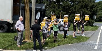 Local UPS Drivers, Activists Engage in Practice Picket Ahead of Looming Strike